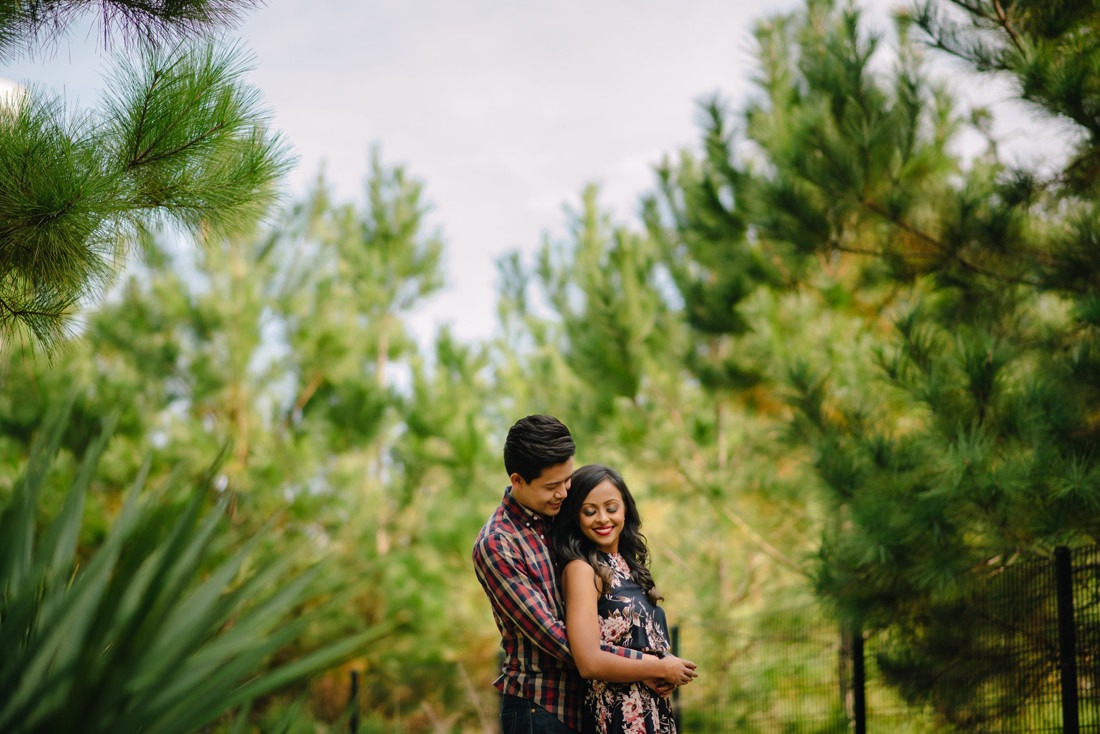 Engagement session at Hermann Park Centennial Gardens Houston Skyline Bayou Park