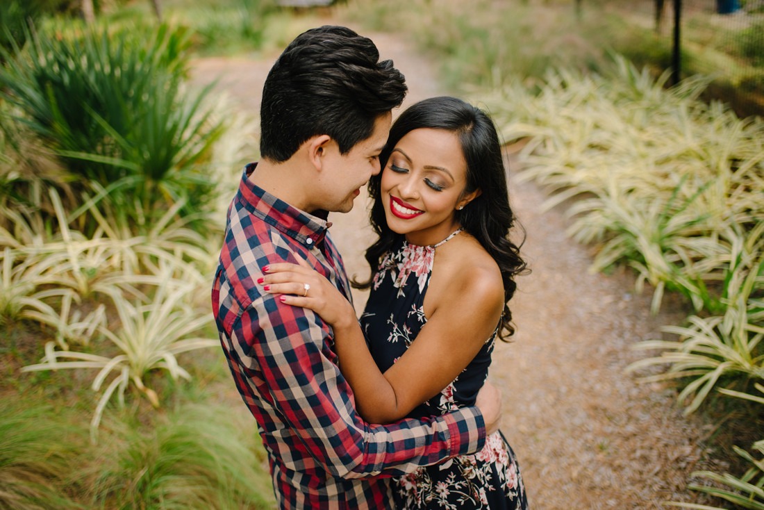 Engagement session at Hermann Park Centennial Gardens Houston Skyline Bayou Park