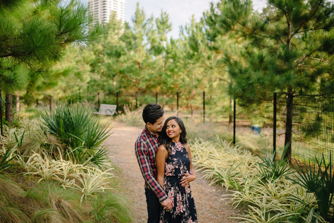 Engagement session at Hermann Park Centennial Gardens Houston Skyline Bayou Park