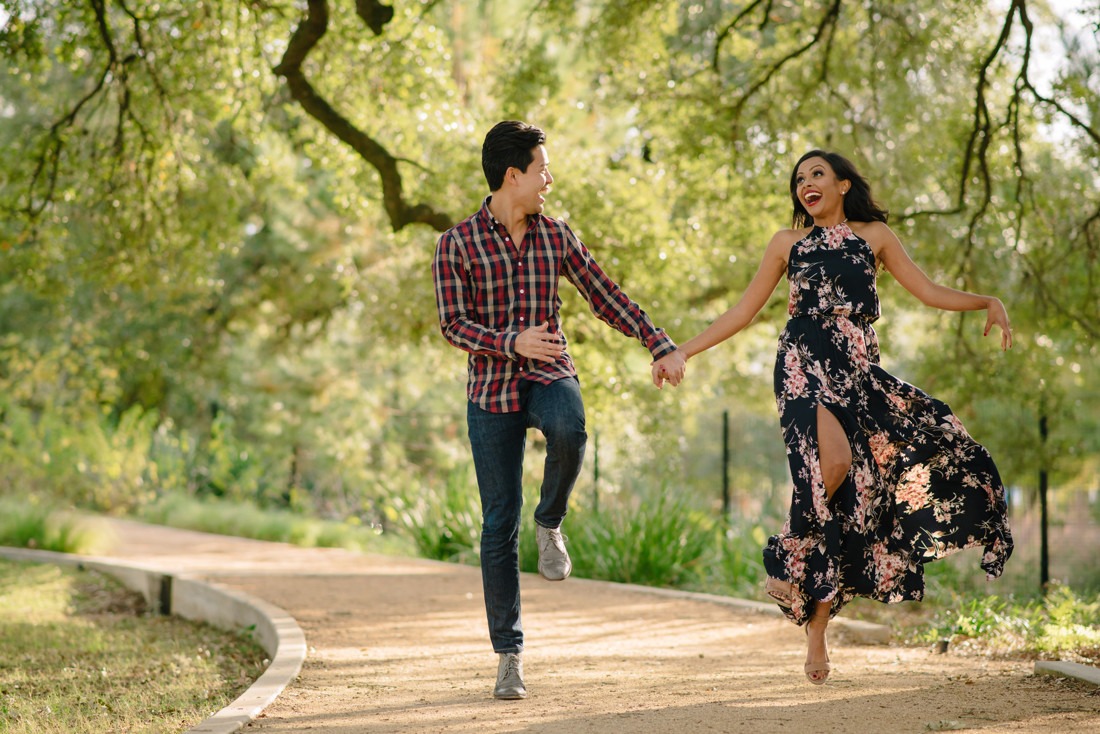 Engagement session at Hermann Park Centennial Gardens Houston Skyline Bayou Park