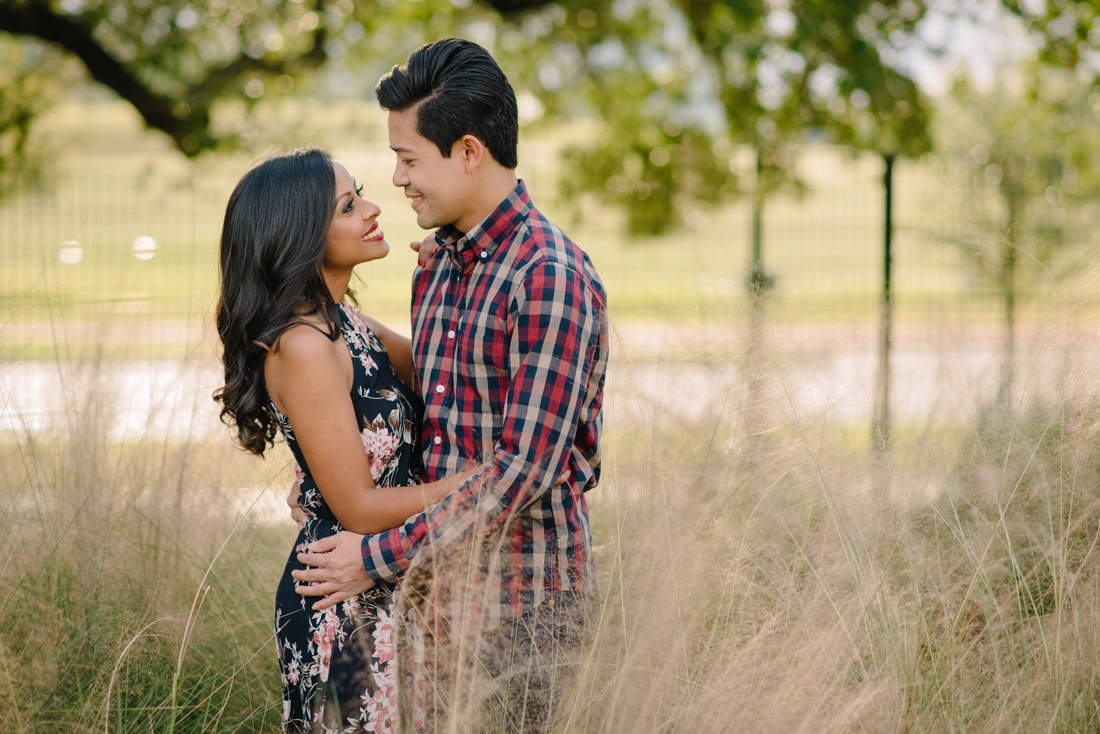 Engagement session at Hermann Park Centennial Gardens Houston Skyline Bayou Park