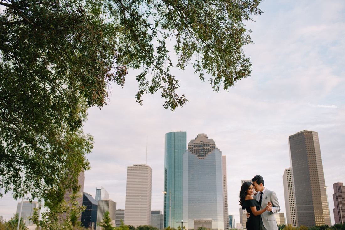 Engagement session at Hermann Park Centennial Gardens Houston Skyline Bayou Park
