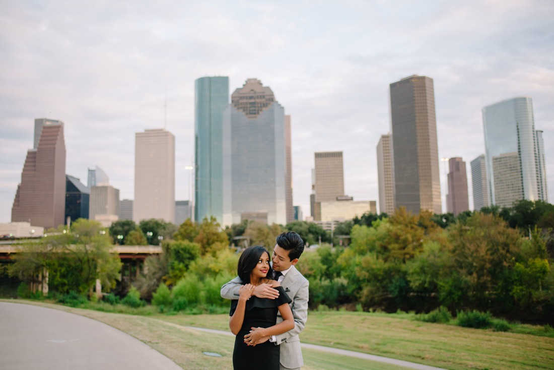 Engagement session at Hermann Park Centennial Gardens Houston Skyline Bayou Park