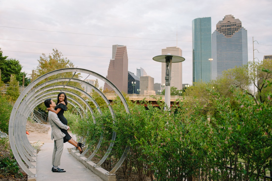 Engagement session at Hermann Park Centennial Gardens Houston Skyline Bayou Park