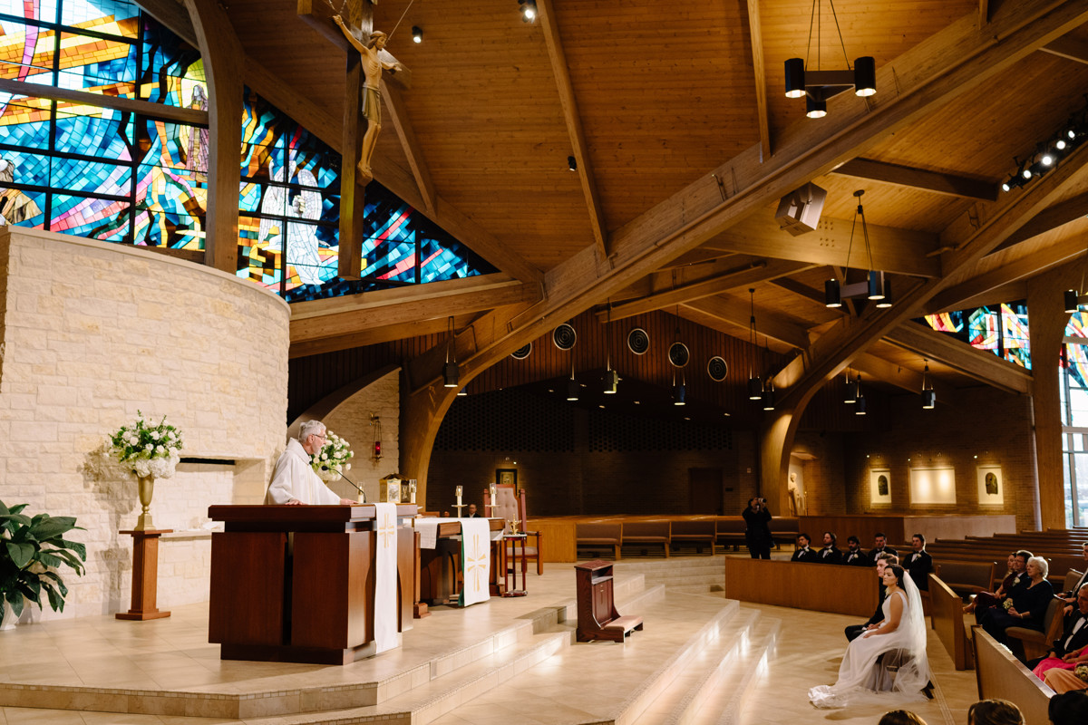 briscoe manor wedding photo st laurence catholic church ceremony houston documentary wedding photographer