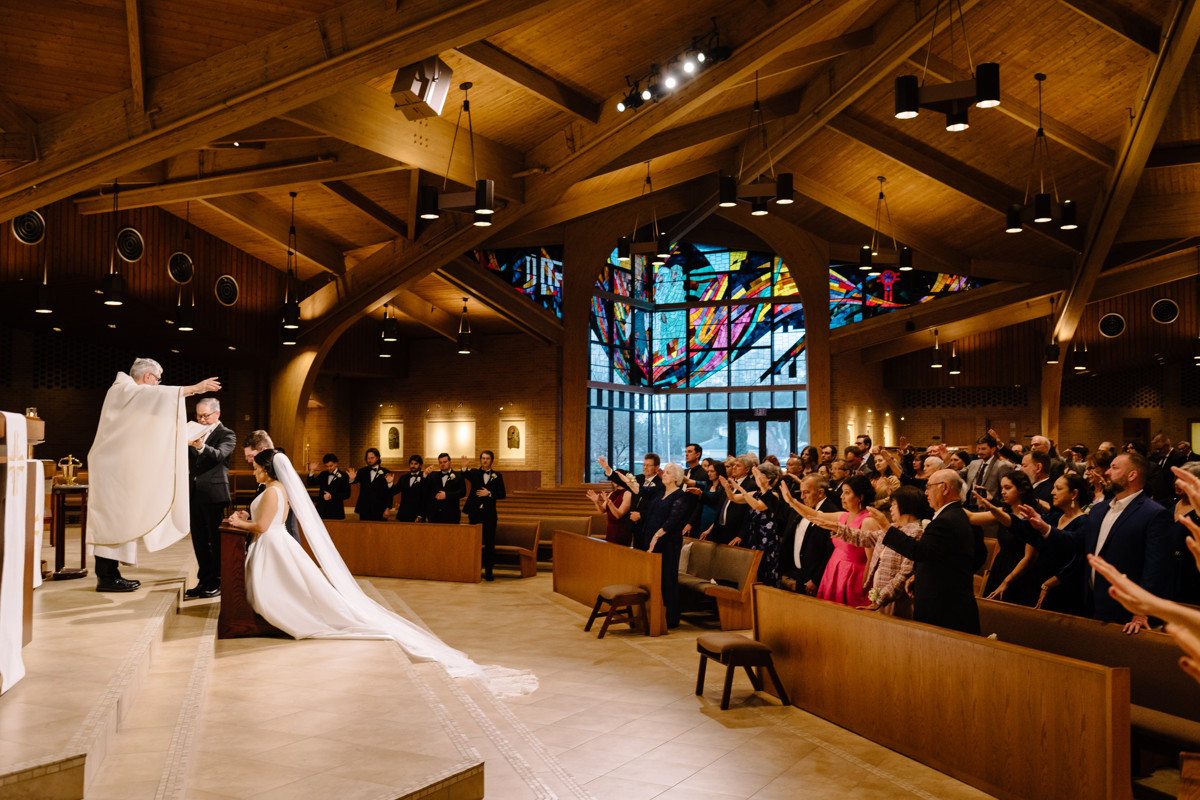 briscoe manor wedding photo st laurence catholic church ceremony houston documentary wedding photographer