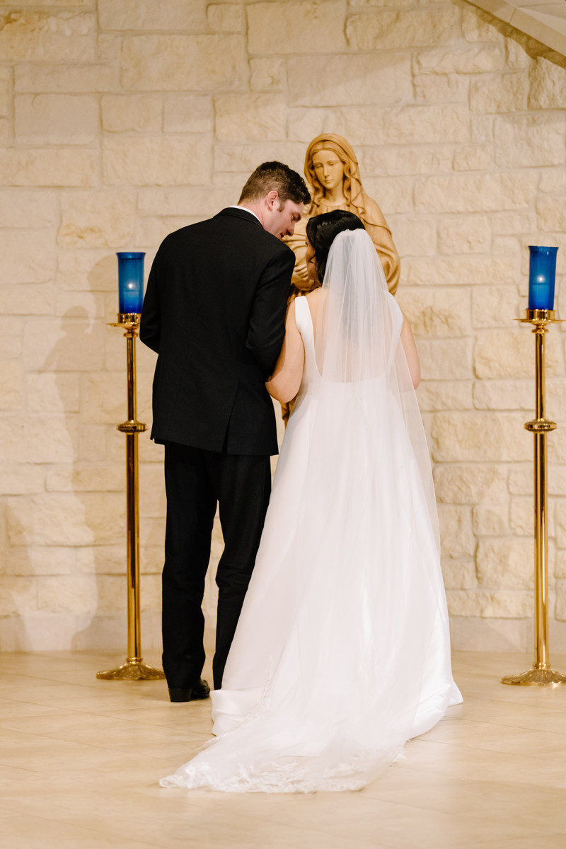 briscoe manor wedding photo st laurence catholic church ceremony houston documentary wedding photographer
