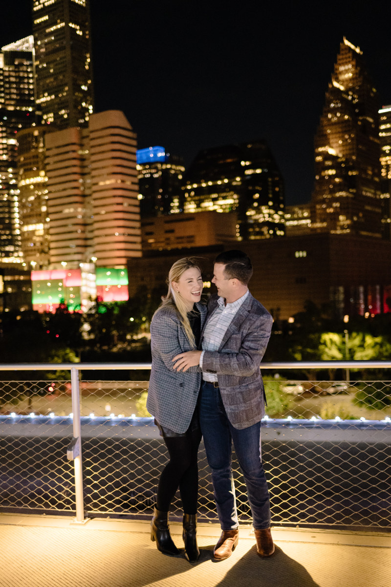 Post houston HTX garden rooftop proposal session during christmas with night houston skyline background