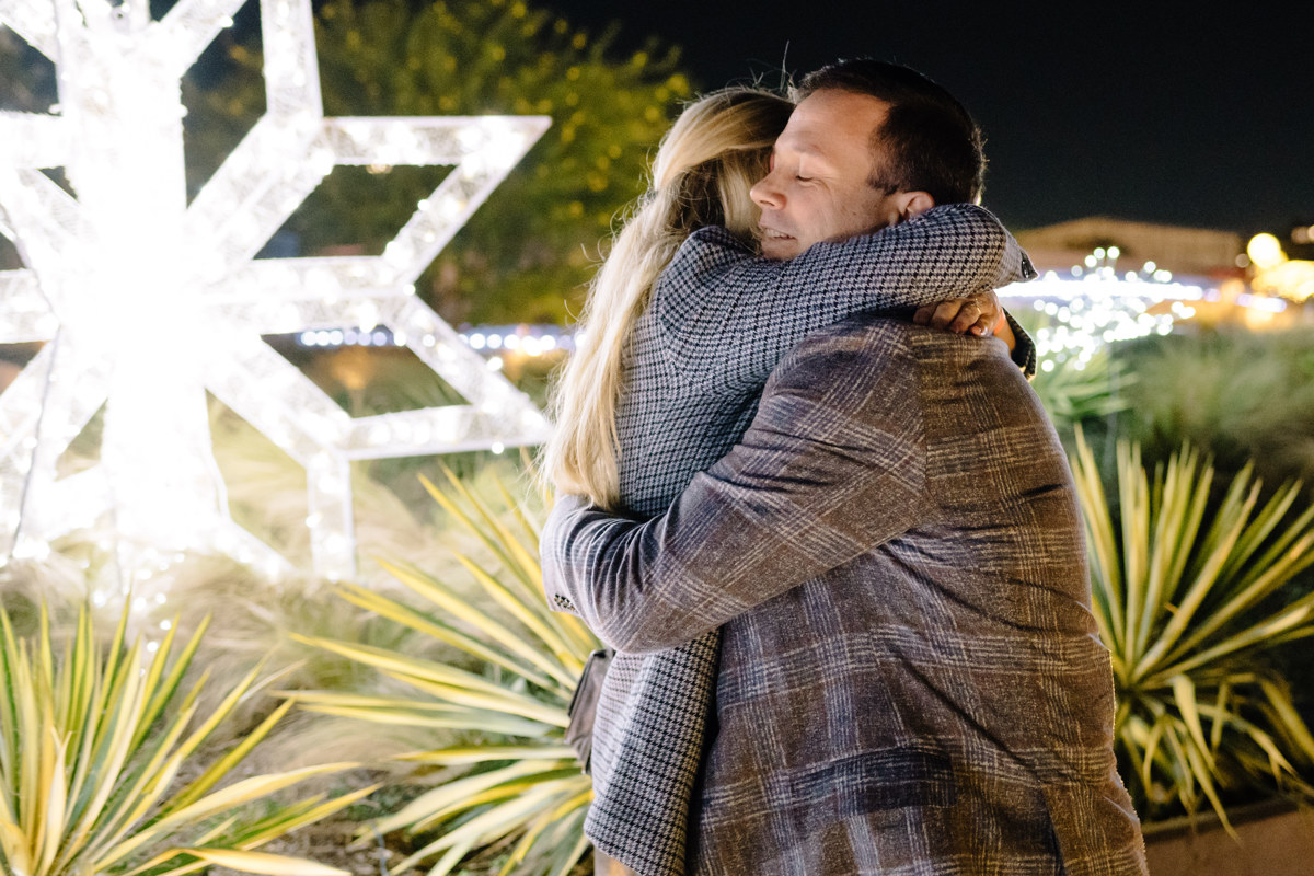 Post houston HTX garden rooftop proposal session during christmas with night houston skyline background